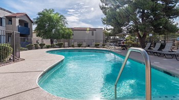 Cantera View of pool with a nice big, green tree overhead